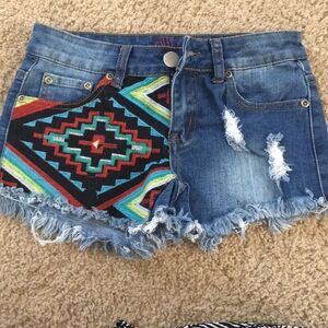 Tribal/Indian pattern distressed denim shorts size 26